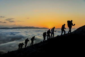 Silhouettes-of-hikers-At-Sunset-000071143375_Large